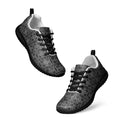 Dancing view of women’s sneakers with monochrome dahlia pattern — Victoria Island Monochrome Charm - black soles