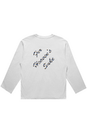 Back of women’s long sleeve white tee reading For Heaven’s Sake with lettering filled with an Aruba sunrise photograph