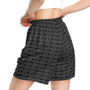 Left back view of female model in unisex mesh shorts with monochrome dahlia pattern — Victoria Island Monochrome Charm