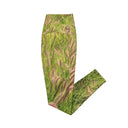Women’s crossover leggings with pockets featuring foxtail fountain grass in green and pinkish-tan tones photographed in Yorba Linda, California