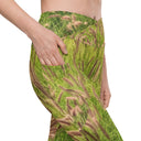 Women’s crossover leggings with pockets featuring foxtail fountain grass in green and pinkish-tan tones photographed in Yorba Linda, California