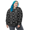 Front view of female model in unisex crew pullover sweatshirt with monochrome dahlia pattern — Victoria Island Monochrome Charm
