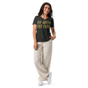 front dark grey heather Women’s V-neck Go With The Flow tee with lettering filled with foxtail fountain grass photographed in Yorba Linda, California
