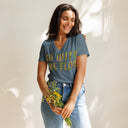 front heather slate Women’s V-neck Go With The Flow tee with lettering filled with foxtail fountain grass photographed in Yorba Linda, California