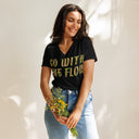 front black Women’s V-neck Go With The Flow tee with lettering filled with foxtail fountain grass photographed in Yorba Linda, California