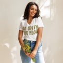 front white Women’s V-neck Go With The Flow tee with lettering filled with foxtail fountain grass photographed in Yorba Linda, California