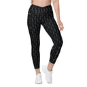 Women’s crossover leggings with pockets featuring a dark repeating Eiffel Tower pattern and Paris detail
