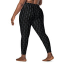 Women’s crossover leggings with pockets featuring a dark repeating Eiffel Tower pattern and Paris detail