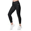 Women’s crossover leggings with pockets featuring a dark repeating Eiffel Tower pattern and Paris detail