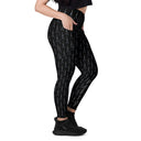 Women’s crossover leggings with pockets featuring a dark repeating Eiffel Tower pattern and Paris detail