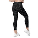 Women’s crossover leggings with pockets featuring a dark repeating Eiffel Tower pattern and Paris detail