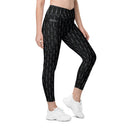 Women’s crossover leggings with pockets featuring a dark repeating Eiffel Tower pattern and Paris detail