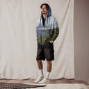 Front view of male model in zip-up hoodie with full-scene Cliffs of Moher coastal print, front zipper, drawcord hood