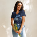 front heather navy Women’s V-neck Just Breathe tee with lettering filled with a scenic Alaska water and mountain photograph