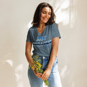 front heather slate Women’s V-neck Just Breathe tee with lettering filled with a scenic Alaska water and mountain photograph