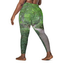 Left back view of model in crossover waist leggings with Legendary Irish Castle Secret Path print captured behind Blarney Castle, Ireland