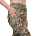 Right pocket view of female model wearing crossover-waist leggings with all-over Cliffs of Moher rock-layer pattern (Nature’s Pattern) by Images On Me.