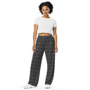 Front view of female model in unisex wide-leg lightweight pants with monochrome dahlia pattern — Victoria Island Monochrome Charm