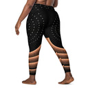 model back Women’s crossover leggings with pockets featuring a black and bronze architectural print from the Dr. Phillips Center for the Performing Arts in Orlando