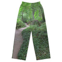 Flat view  of male model in unisex wide-leg lightweight pants with Legendary Irish Castle Secret Path print captured behind Blarney Castle, Ireland
