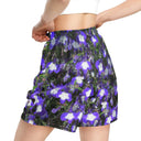 Left back close-up view of female model in unisex mesh shorts featuring Castle Lobelias floral print captured at Dromoland Castle, County Clare, Ireland