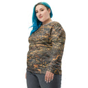 Right front view of female model in larger size pullover sweatshirt with all-over Cliffs of Moher rock-layer pattern; ribbed crew neck, cuffs, and hem 