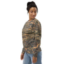 Left side view of female model in pullover sweatshirt with all-over Cliffs of Moher rock-layer pattern; ribbed crew neck, cuffs, and hem 