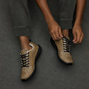 Men’s Vaulted Glory sneakers with a warm gold and brown geometric pattern inspired by Gothic fan-vault architecture in London