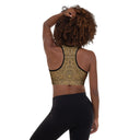 model back Padded women’s Vaulted Glory sports bra with a warm gold geometric pattern inspired by Gothic fan-vault architecture in London