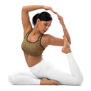 yoga model Padded women’s Vaulted Glory sports bra with a warm gold geometric pattern inspired by Gothic fan-vault architecture in London