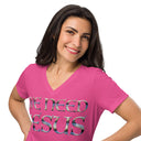 berry close up of model wearing Women’s We Need Jesus Sunrise V-neck tee with lettering filled with an Aruba sunrise photograph