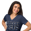 heather navy close-up of model wearing Women’s We Need Jesus Sunrise V-neck tee with lettering filled with an Aruba sunrise photograph