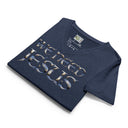 heather navy flat view of Women’s We Need Jesus Sunrise V-neck tee with lettering filled with an Aruba sunrise photograph